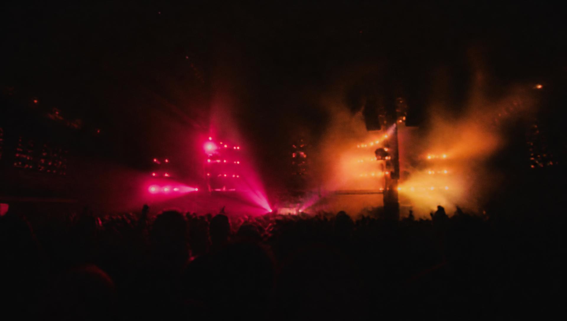 LEIJA live under pink and amber stage lights